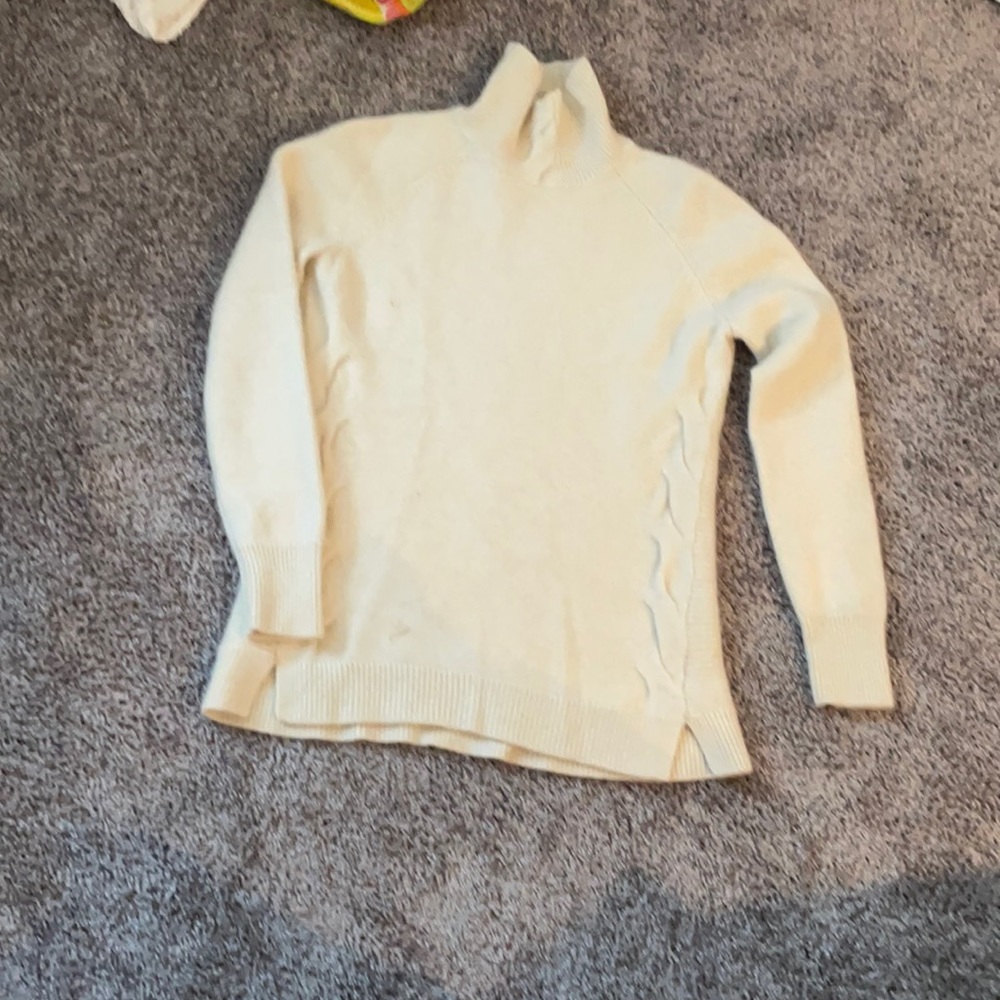 Cream colored cashmere turtleneck. Size medium but fits more like a small